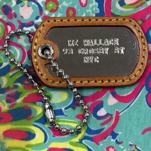 MZ Wallace Silver Bag Charm with New York Address on it